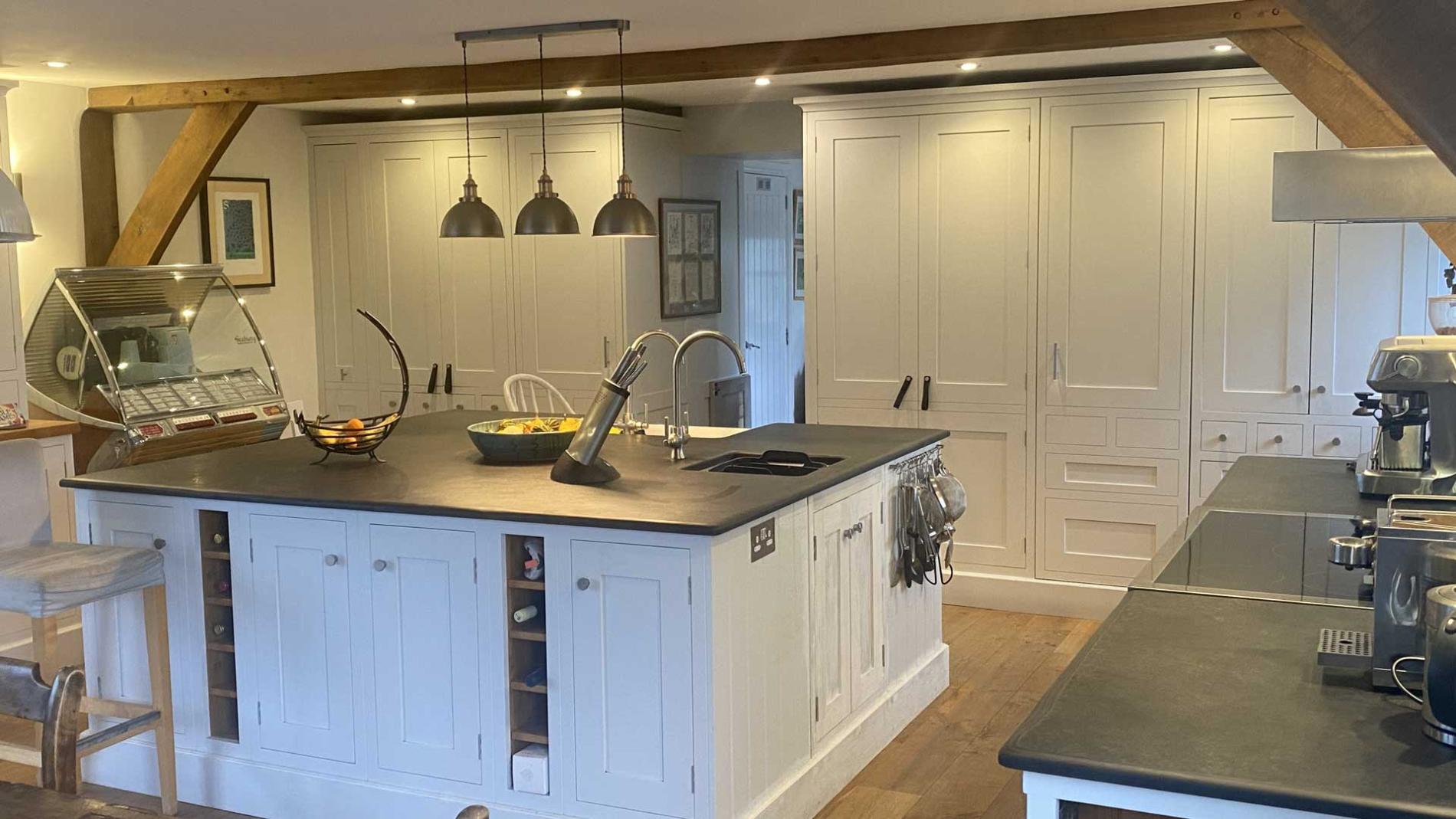 White Kitchen Units with a Slate Worktop & Island