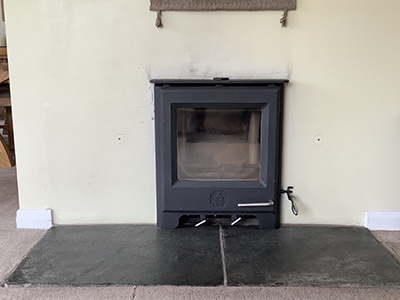 Firehearth with old slate hearth