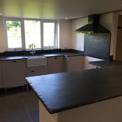 Kitchen with two sides both with slate worktops