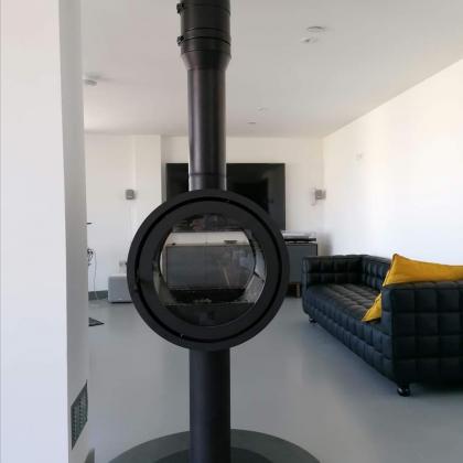 raised contemporary modern woodburner with slate round hearth