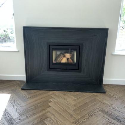 polished contemporary custom designed slate fire surround