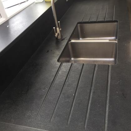 dark grey slate double sided sink with drainage channels