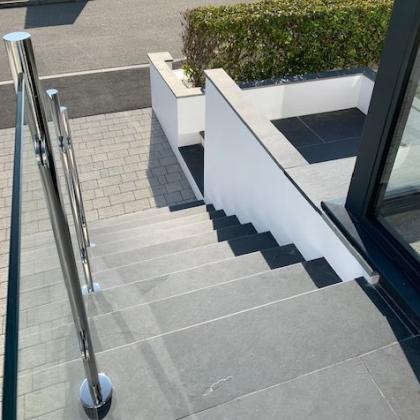 architect designed contemporary modern slate steps with hand rail