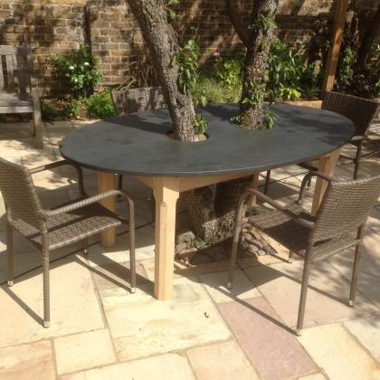 Outdoor table top in slate custom made to fit around a tree