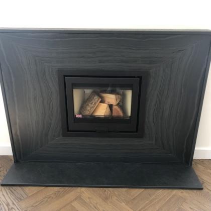 chamfered, mitred and hand polished slate fire suround