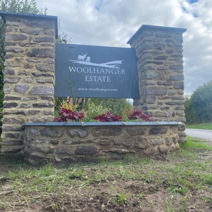large sign custom built and engraved for the woolhanger estate