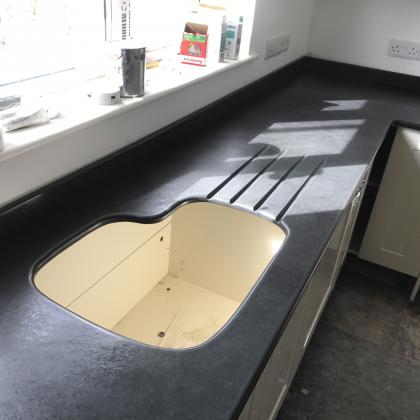 Worktop for new kitchen in slate with custom cut sink insert shape