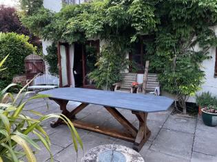 outdoor rectangular table with slate top and wood base custom designed