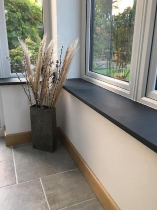 long slate window cills in dark grey for an alternative to traditional wood