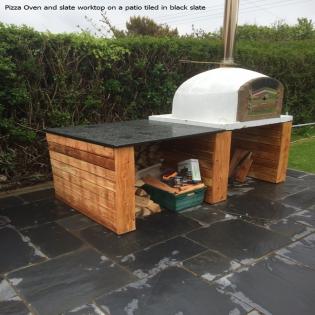 Wood Burning Pizza Oven with wood structure and slate bbq worktop