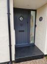 slate front door step in slate with smooth over hang