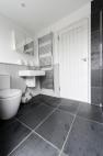 Bathroom with flagstone slab slate flooring