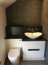 bathroom vanity unit with black slate top