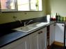 sink surround in slate with over hanging tap