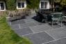 Slate flagstones that are hand split in Devon and laid in a traditional cottage garden