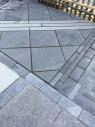Diamond patio pattern dark grey slate paving with light grey slate thtrough the middle