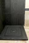 slate shower tray with shower cladding tiles in slate
