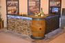 Slate and stone bar in a v shape with barrel corner