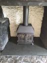 Cottage style woodburner with a slate hearth