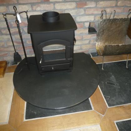 woodburner on a rounded slate fire hearth